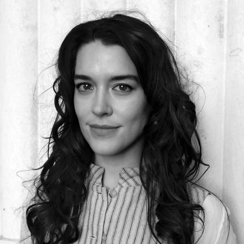 long-haired woman looking at viewer