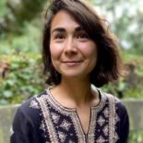 blurry picture of a woman with shoulder-length hair